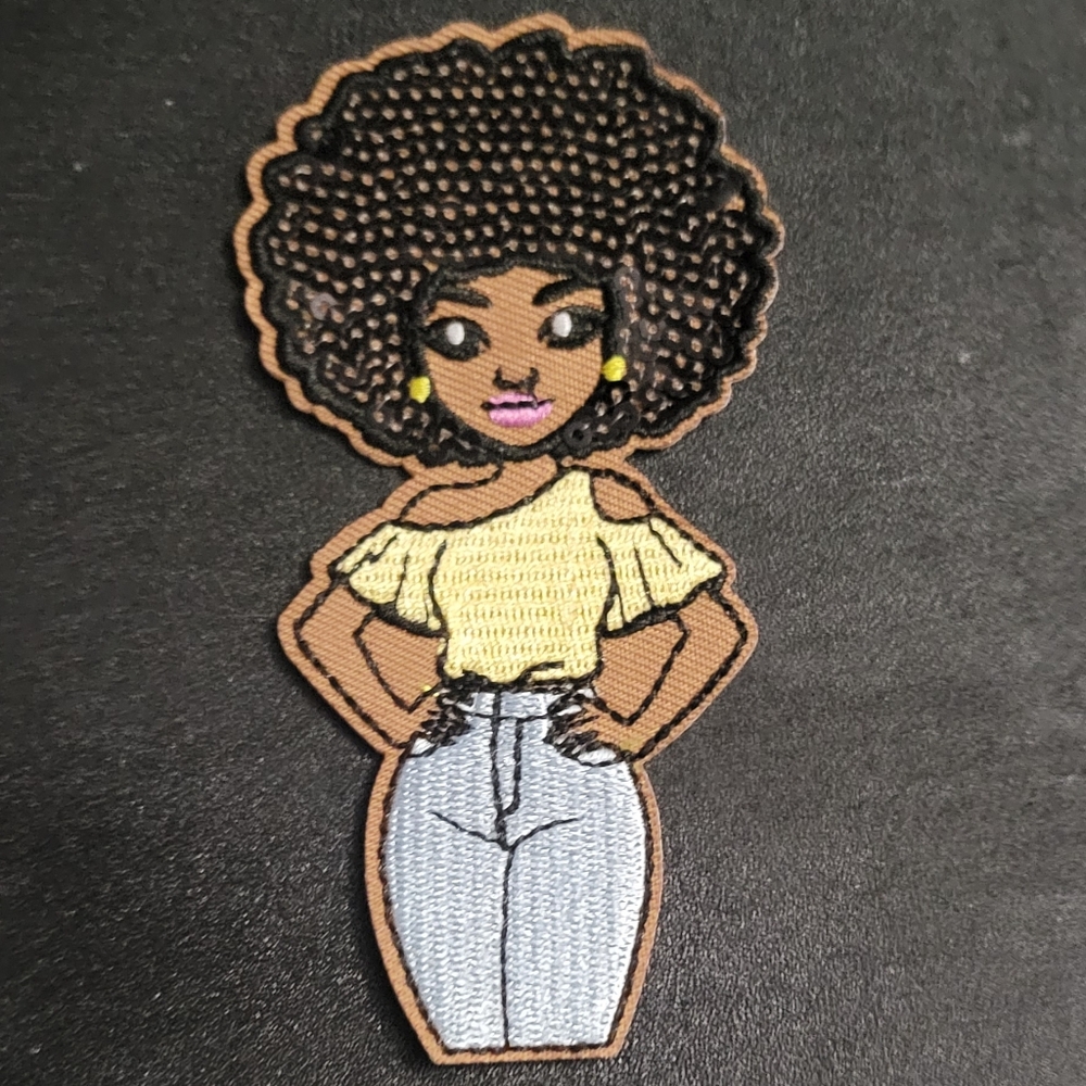 Embroidered Patch with Yellow Top and Blue Jeans